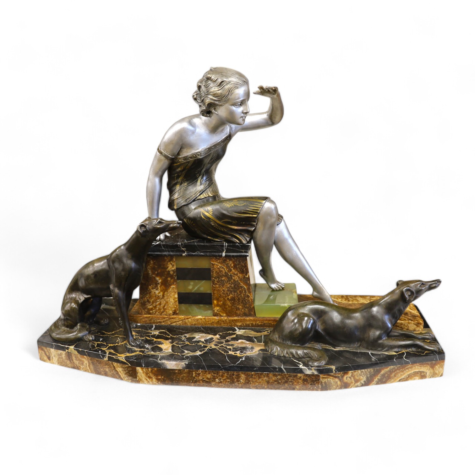 A French Art Deco patinated spelter figure of a lady with two hounds mounted on coloured marble seat and stand, Uriano, 60cm wide x 44cm high. Condition - good